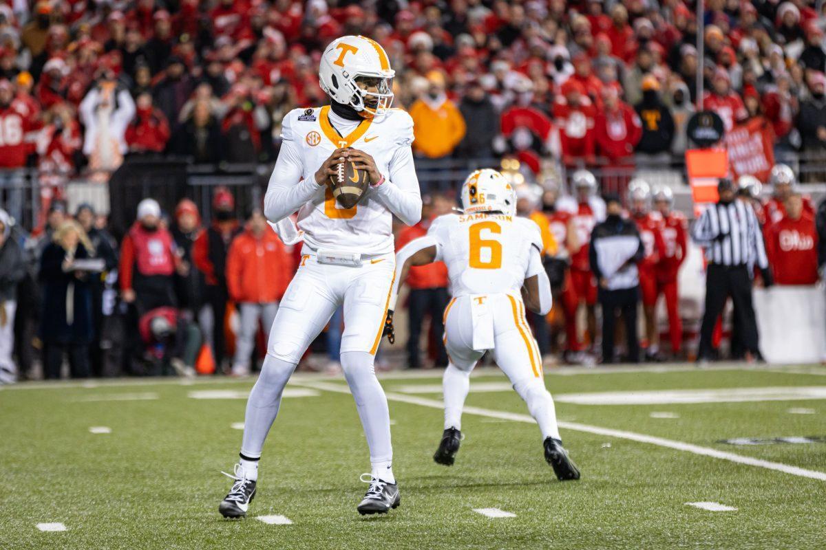 Nico Iamaleava (8) scans the field during a playoff game against Ohio State at Ohio Stadium. Saturday, Dec. 21, 2024.