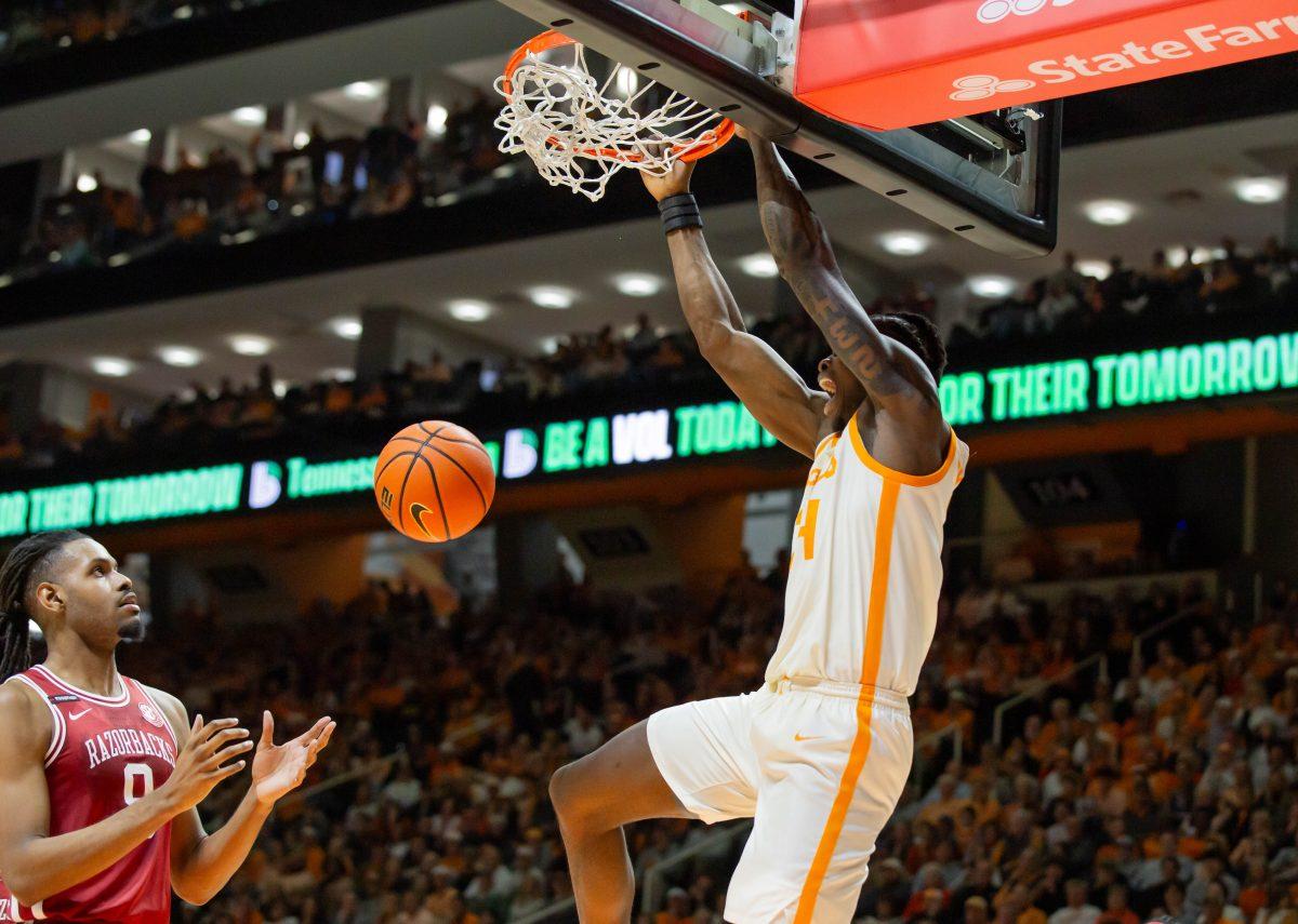 Felix Okpara (34) dunks the ball on Arkansas at Thompson-Boling Arena at Food City Center. Saturday, Jan. 4, 2025.