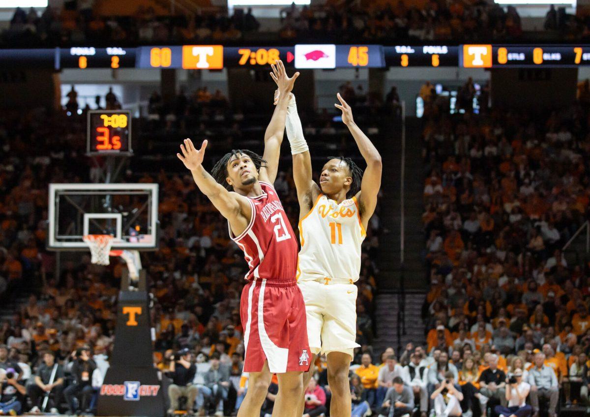Jordan Gainey (11) shoots a three-point shot during the game against Arkansas at Thompson-Boling Arena at Food City Center. Saturday, Jan. 4, 2025.