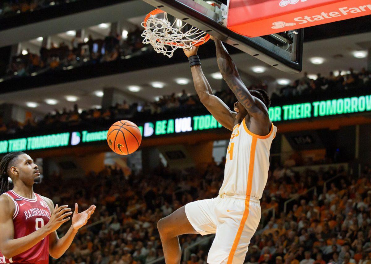 Felix Okpara (34) dunks the ball on Arkansas at Thompson-Boling Arena at Food City Center. Saturday, Jan. 4, 2025.