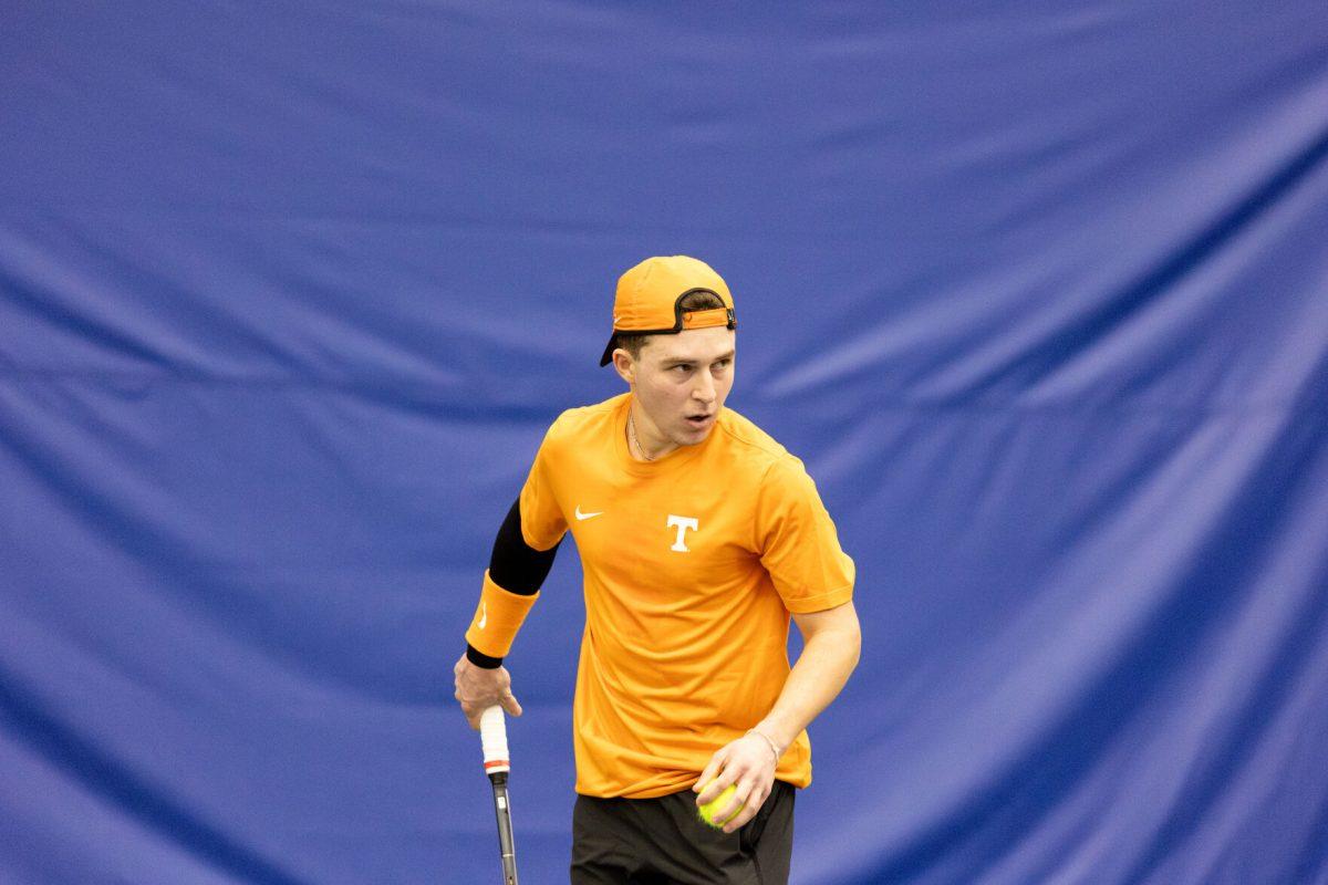 Alejandro Moreno gets ready to serve against Illinois at Goodfriend Tennis Center. Saturday, Jan. 25, 2025.
