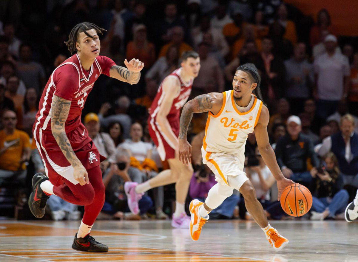 Zakai Zeigler (5) steals the ball from Arkansas at Thompson-Boling Arena at Food City Center. Saturday, Jan. 4, 2025.