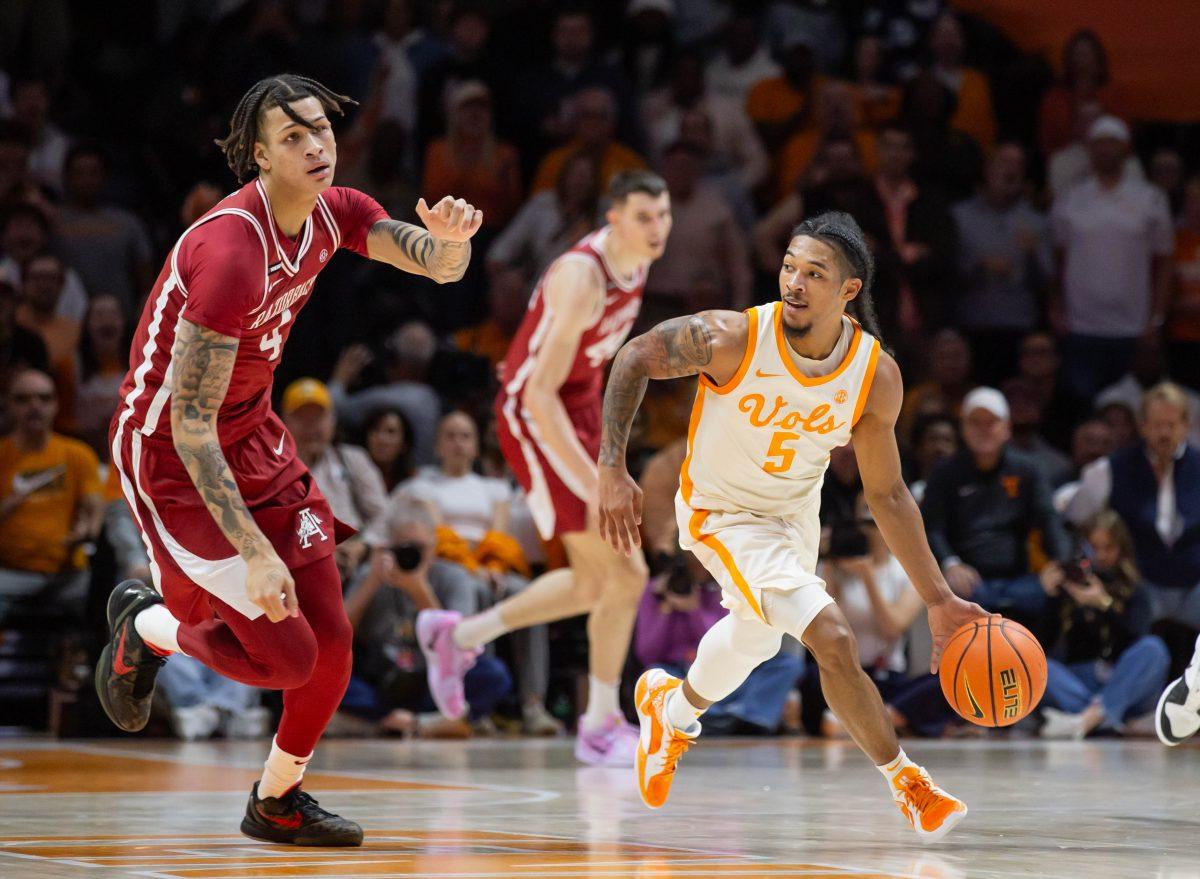 Zakai Zeigler (5) steals the ball from Arkansas at Thompson-Boling Arena at Food City Center. Saturday, Jan. 4, 2025.