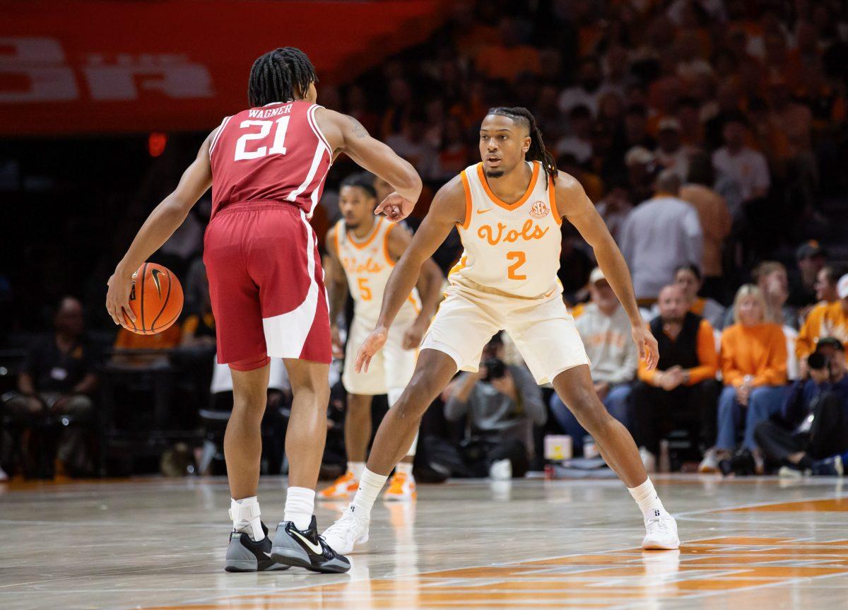 Chaz Lanier (2) guards an Arkansas player at Thompson-Boling Arena at Food City Center. Saturday, Jan. 4, 2025.