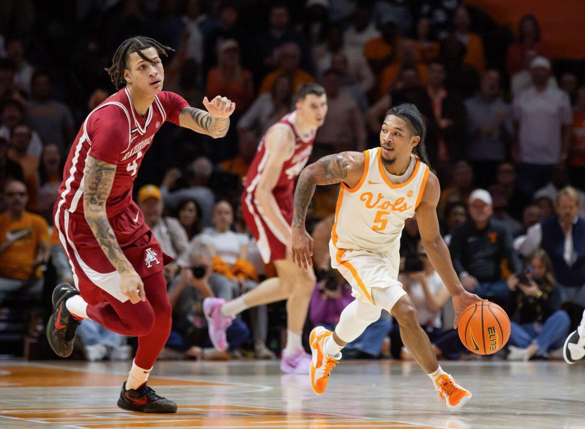 Zakai Zeigler (5) steals the ball from Arkansas at Thompson-Boling Arena at Food City Center. Saturday, Jan. 4, 2025.