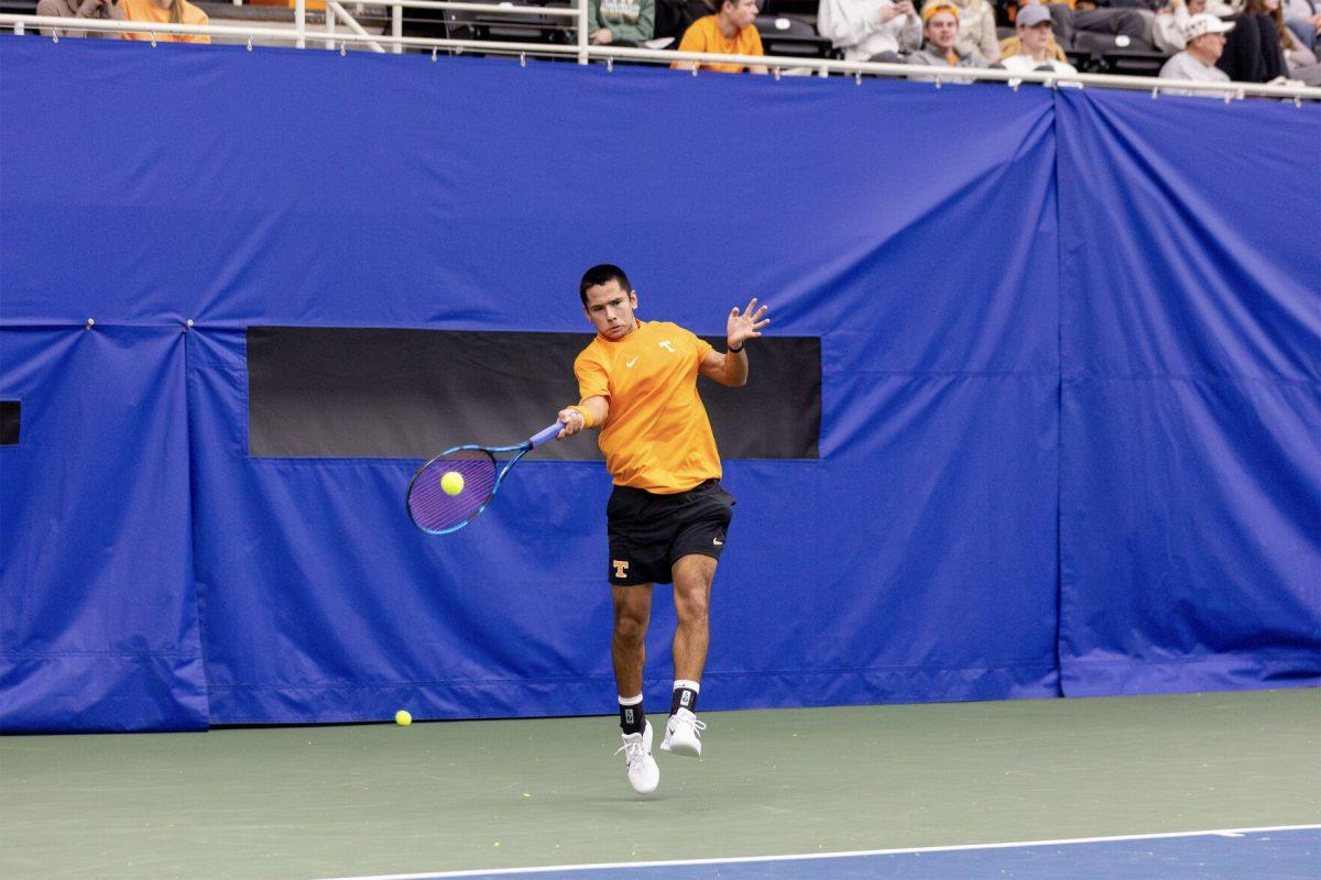 Jose Garcia hits against Illinois at Goodfriend Indoor Tennis Center. Saturday, Jan. 25, 2025.