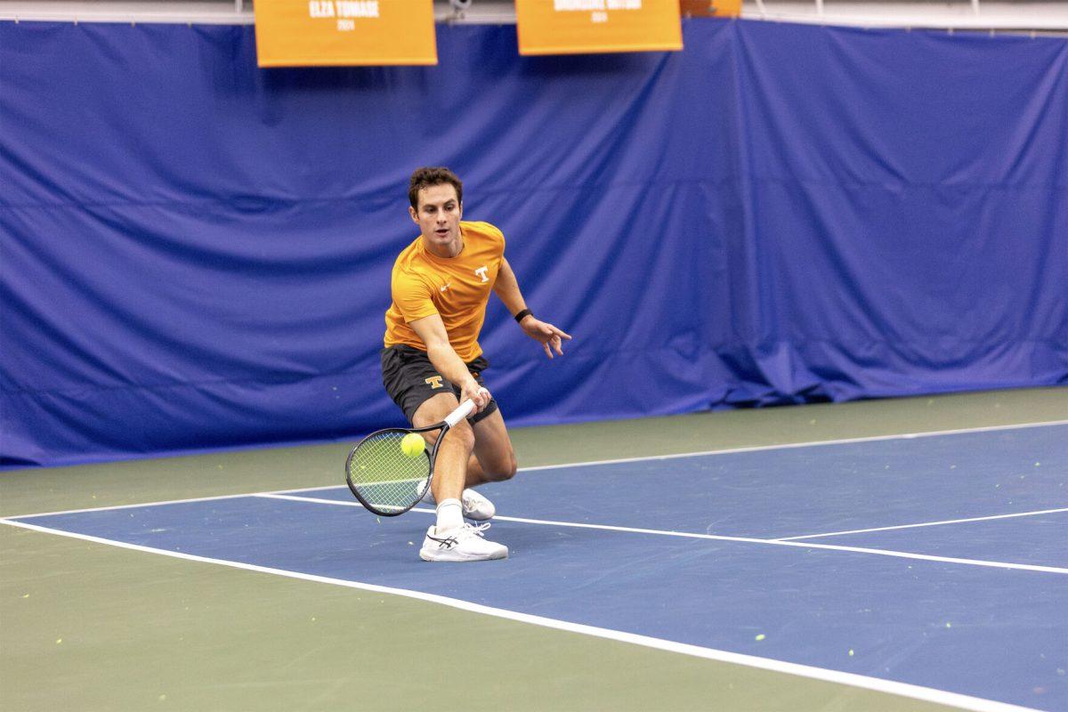 Alex Kotzen hits against Illinois at Goodfriend Indoor Tennis Center. Saturday, Jan. 25, 2025.