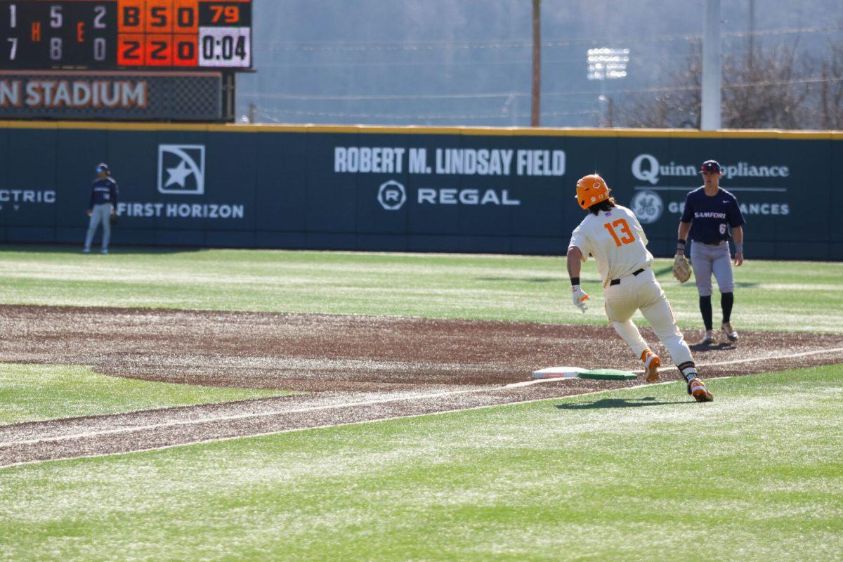 Reese Chapman (13) rounds first base in game against Samford at Lindsey Nelson Stadium. Sunday, Feb. 23, 2025.