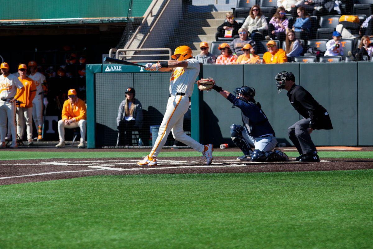 Hunter Ensley (9) swings at pitch in game against Samford at Lindsey Nelson Stadium. Sunday, Feb. 23, 2025.