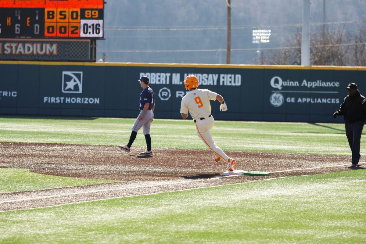 Hunter Ensley (9) rounds first base in game against Samford at Lindsey Nelson Stadium. Sunday, Feb. 23, 2025.