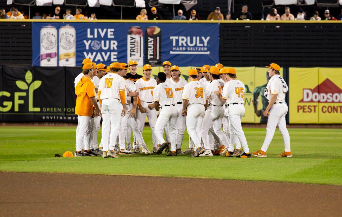 Members of the Tennessee baseball team hype each other up before the Orange and White game at Kodak Stadium. Friday, Nov. 8, 2024.