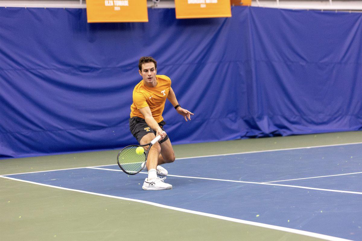 Alex Kotzen hits against Illinois at Goodfriend Indoor Tennis Center. Saturday, Jan. 25, 2025.
