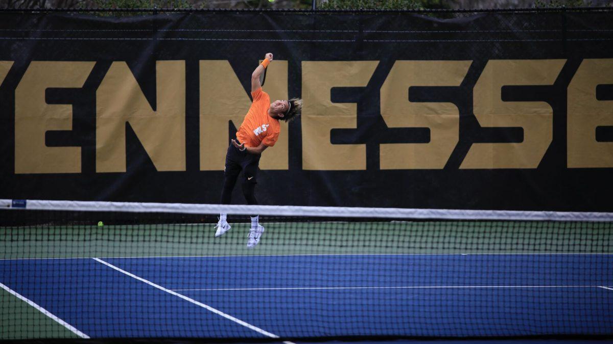 Shunsuke Mitsui delivers the serve during the match against Penn at Barksdale Stadium. Saturday, Feb. 8, 2025.