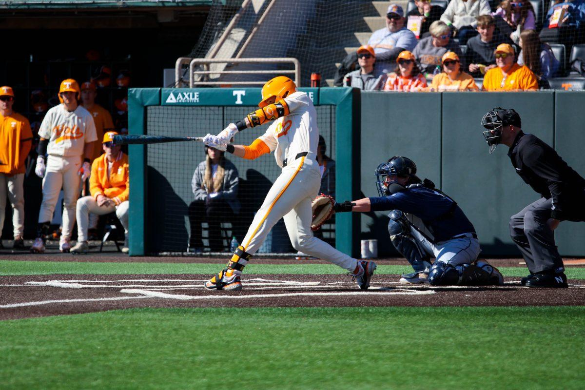 Manny Marin (4) swings at a pitch in game against Samford at Lindsey Nelson Stadium. Sunday, Feb. 23, 2025.
