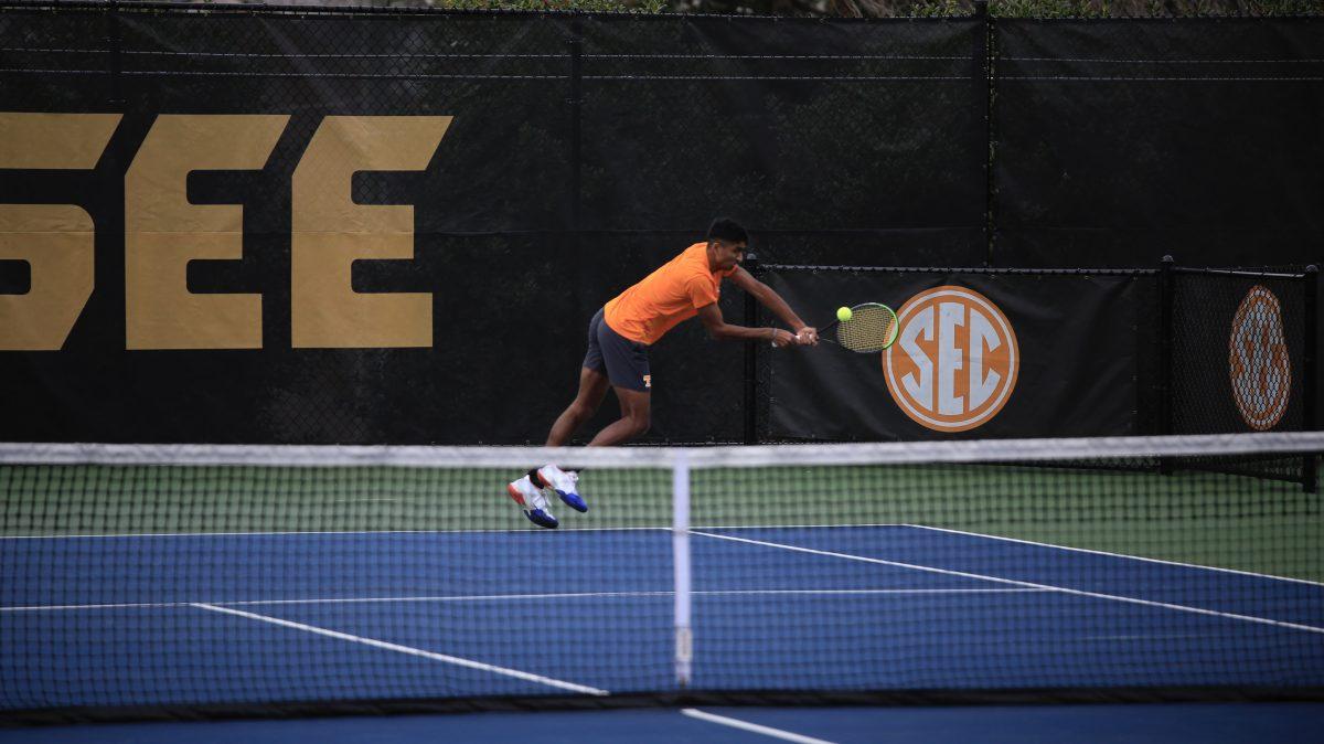 Alan Jesudason returns the serve during the match against Penn at Barksdale Stadium. Saturday, Feb. 8, 2025.