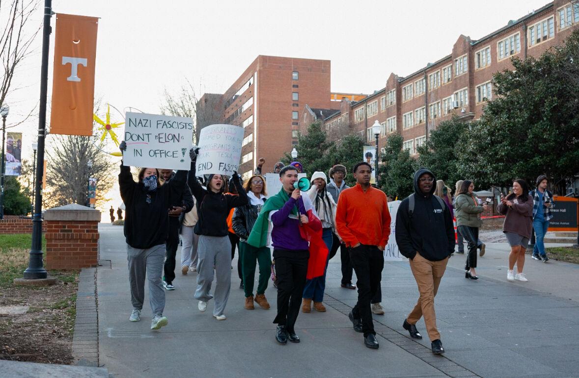Students participating in the protest against fascism march down Pedestrian Walkway. Monday, Feb. 17, 2025.