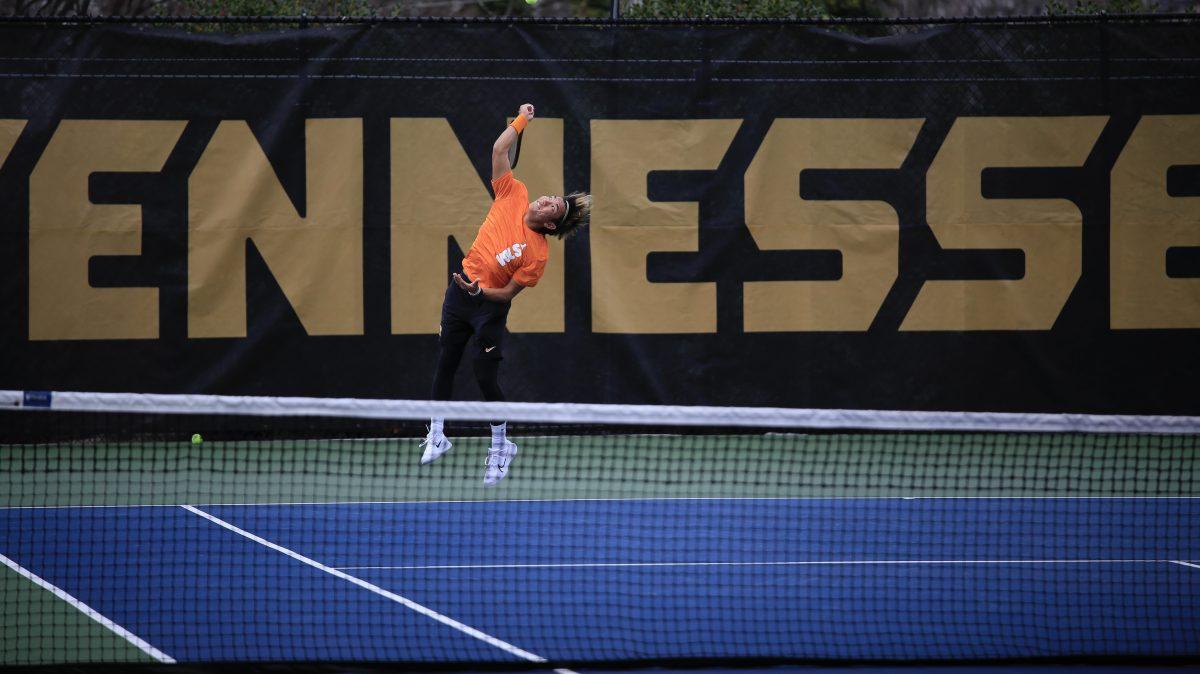 Shunsuke Mitsui delivers the serve during the match against Penn at Barksdale Stadium. Saturday, Feb. 8, 2025.