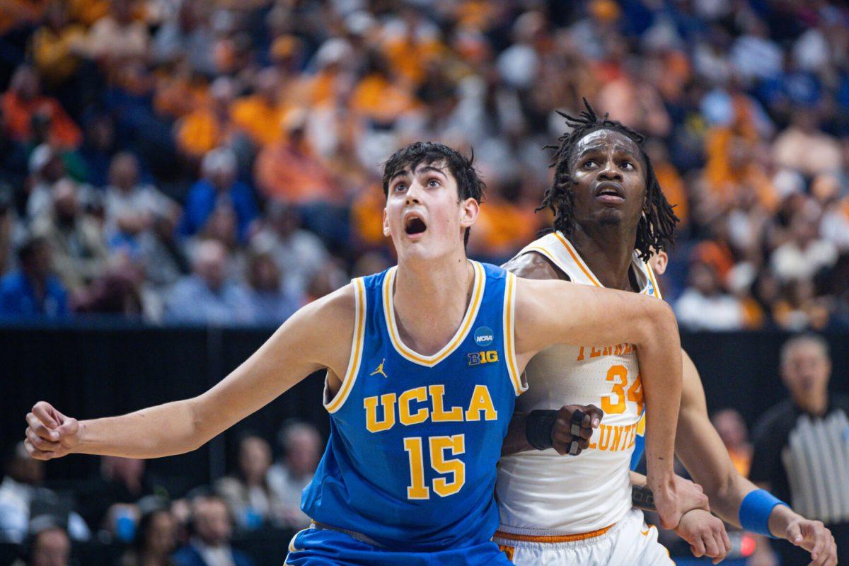 Felix Okpara (34) battles for a rebound during an NCAA Tournament game against UCLA at Rupp Arena. Saturday, March 22, 2025.