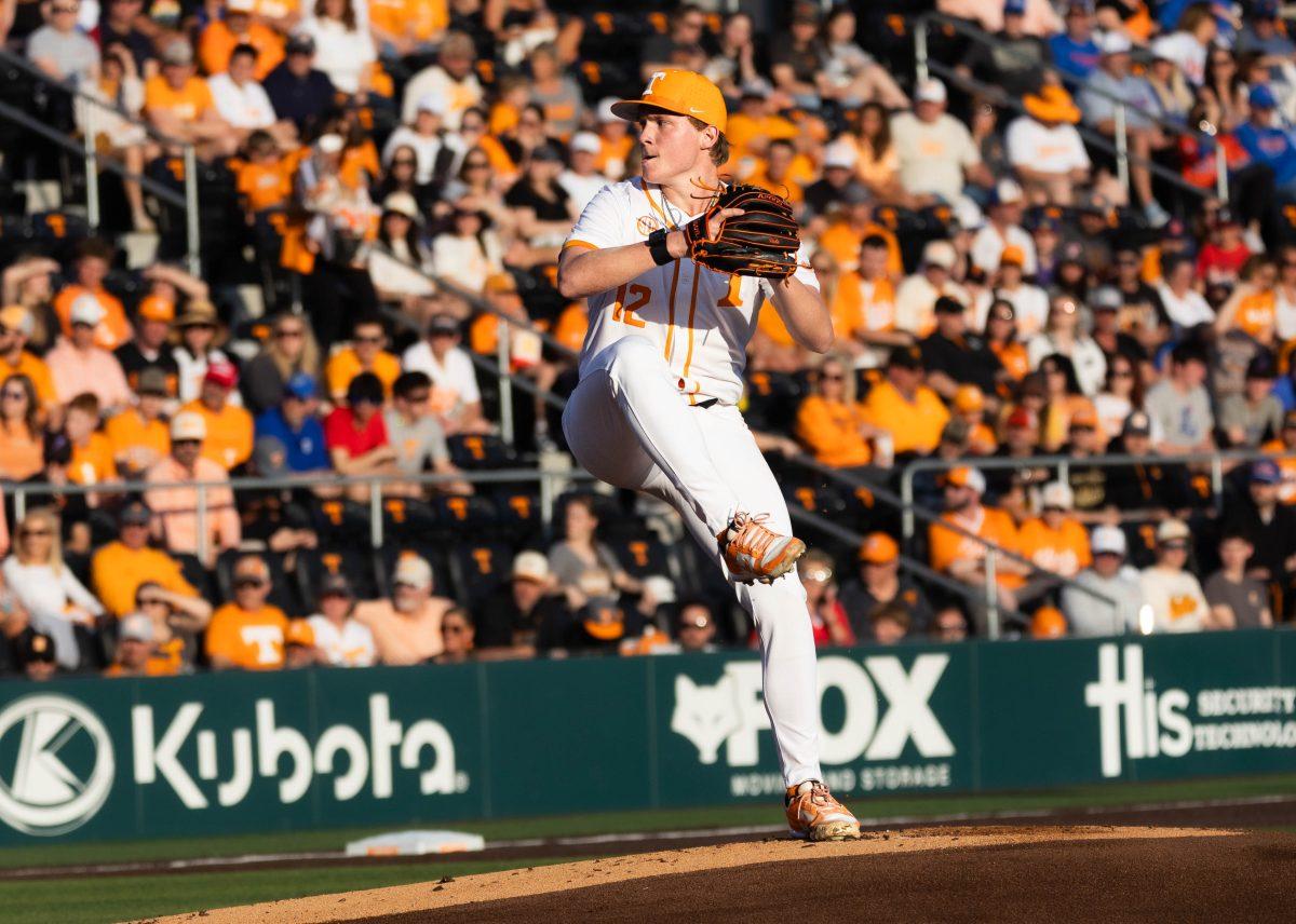 Liam Doyle (12) winds up to pitch against Florida in Lindsey Nelson Stadium. Friday, Mar. 14, 2025.