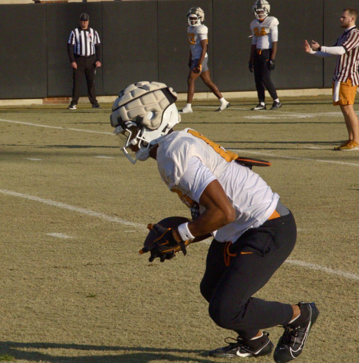 Wide receiver Travis Smith Jr. (80) catches a pass during Tennessee football's spring practice. Wednesday, March 12, 2025.