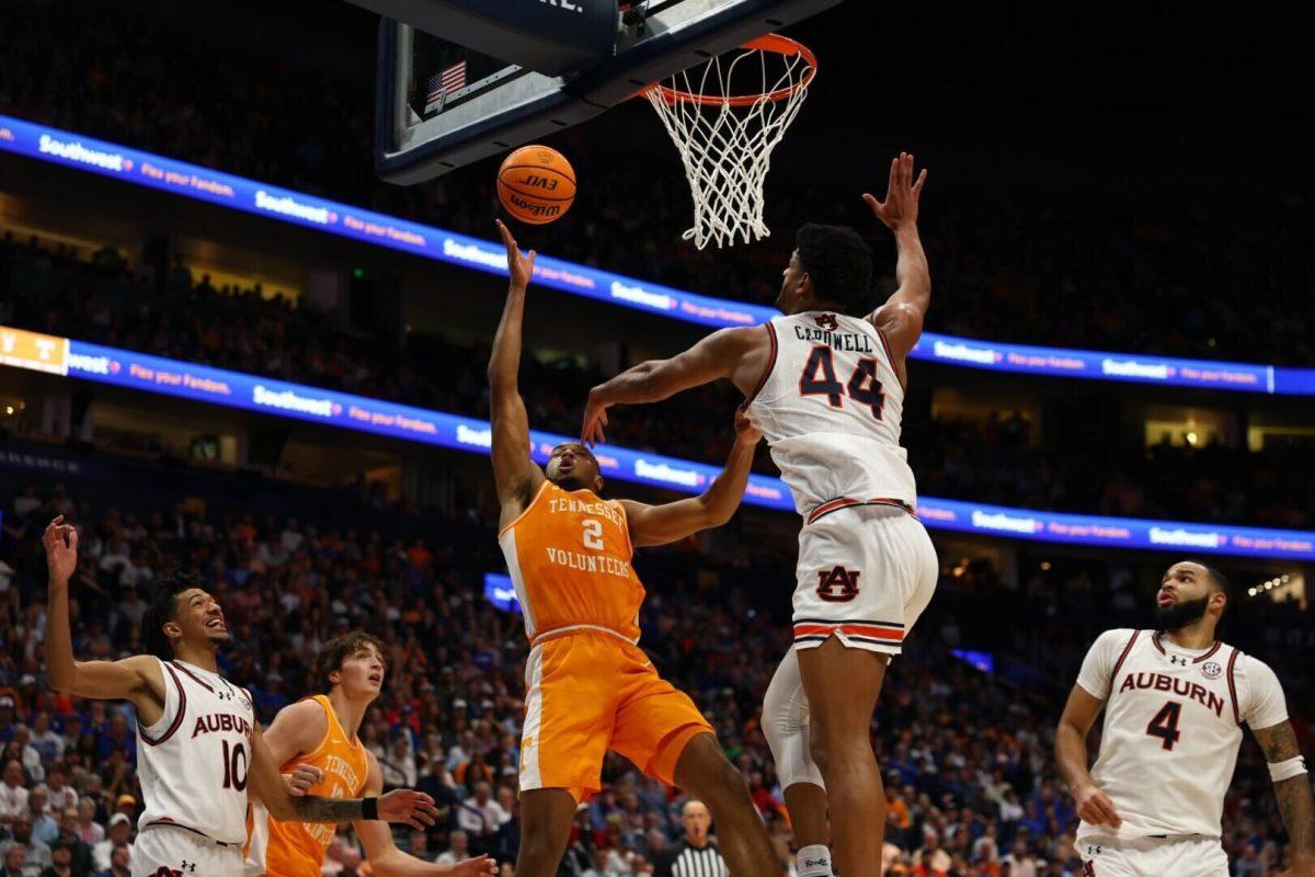 Chaz Lanier (2) puts a tough layup up at the rim against Auburn at Bridgestone Arena in the SEC Tournament. Saturday, March 15, 2025. 