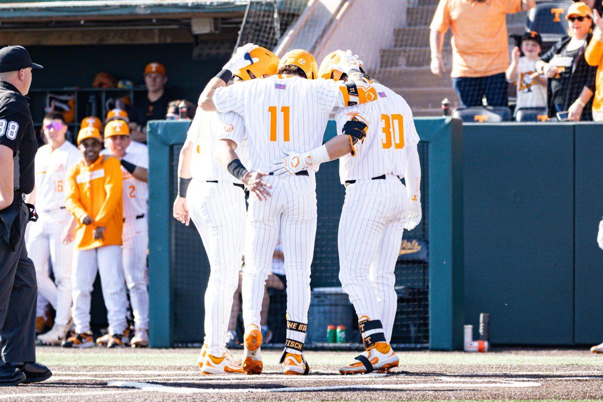 Andrew Fischer (11) celebrates a home run with his teammates during a game against West Georgia at Lindsey Nelson Stadium. Tuesday, March 11, 2025.