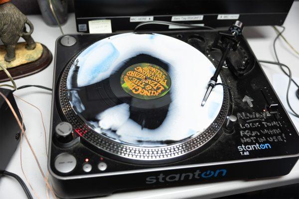 A turntable playing a record in WVLT's radio station. Wednesday, April 9, 2025.