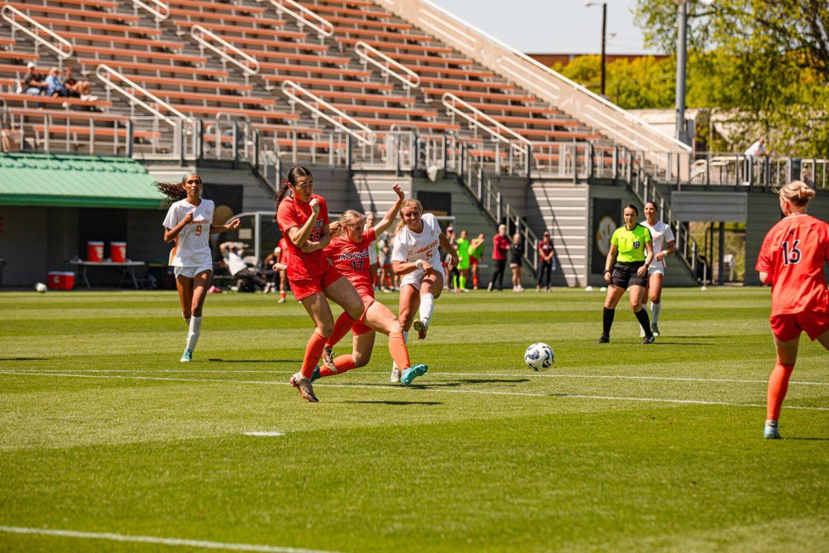 Jenna Stayart's (5) shot gets blocked during a spring matchup against Virginia Tech at Regal Stadium. Sunday, April 13, 2025.
