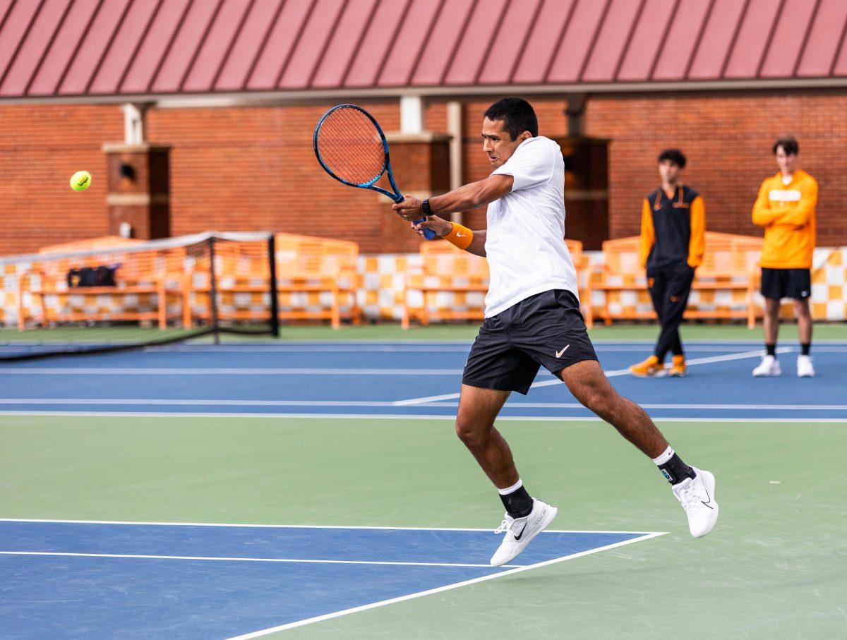Jose Garcia hits the ball to Texas A&amp;M in Barksdale Tennis Stadium. Friday, Apr. 11, 2025.