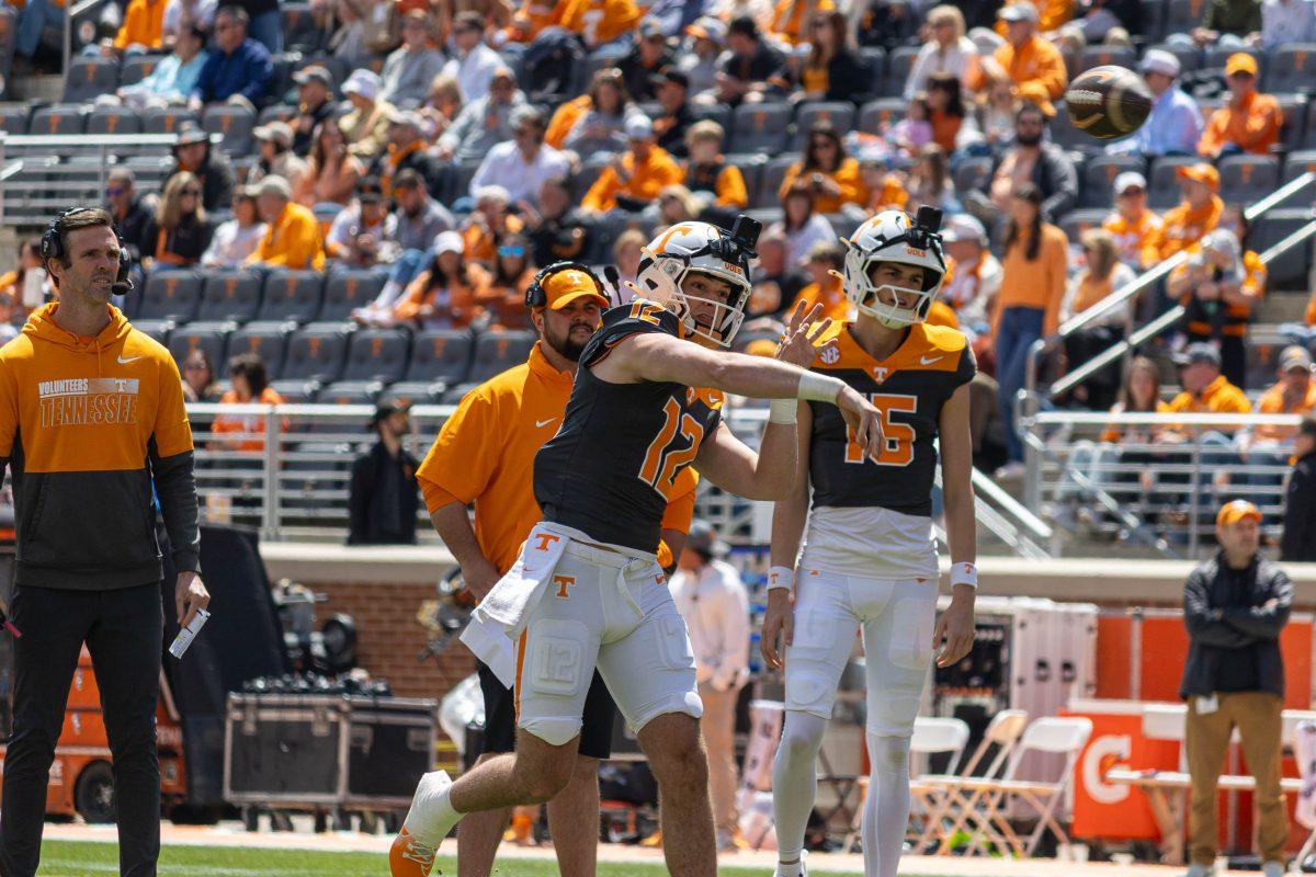Jake Merklinger (12) passing the football during warmups  at the Orange &amp; White game at Neyland Stadium. Saturday, April 12, 2025.