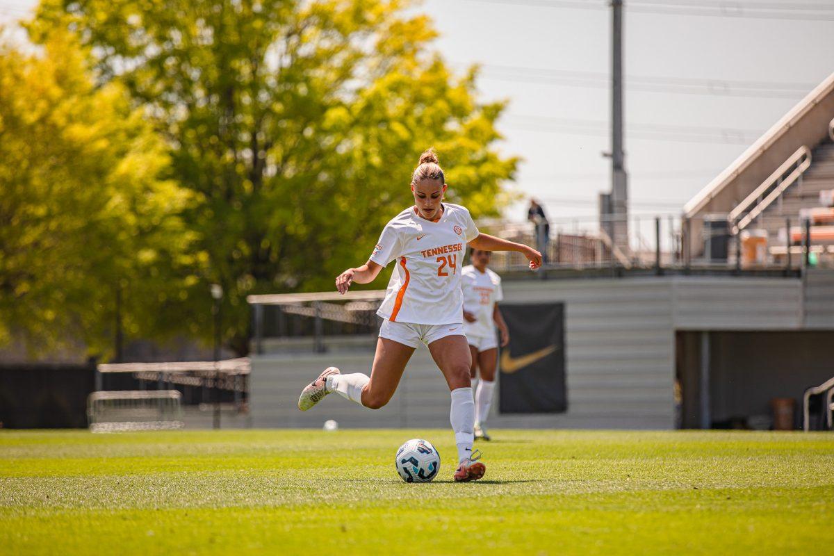 Jasmine Boggs (24) passes the ball forward during a spring matchup against Virginia Tech at Regal Stadium. Sunday, April 13, 2025.