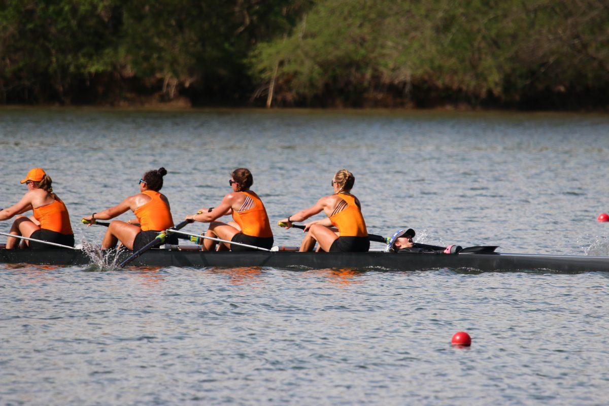 Coxwain Laila Irigoyen seen coaching her boat through the last 500 meters of their race during Rocky Top Invite at Melton Hill Lake. Friday, April 4, 2025.