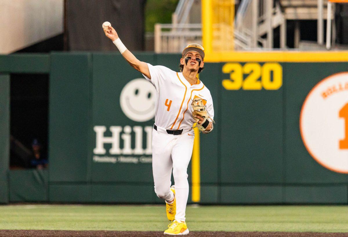Manny Marin (4) throws the ball the first base during the game against Kentucky in Lindsey Nelson Stadium. Friday, April 18, 2025.