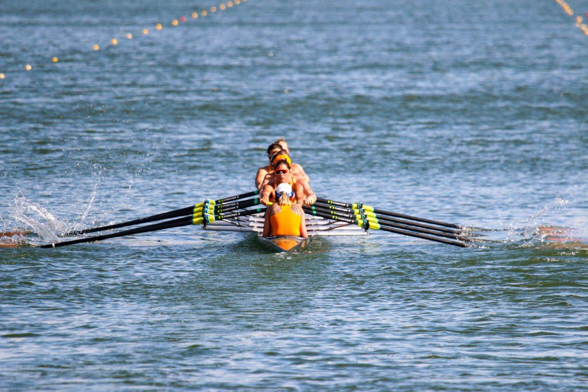 Tennessee's 2V8 seen perfectly in-sync as they work down the race course during Rocky Top Invite on Melton Hill Lake. Friday, April 4, 2025.