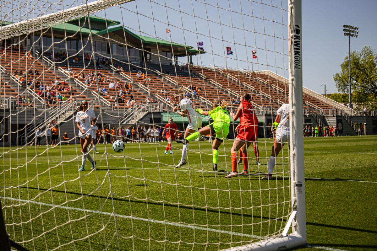 Alivia Stott (8) scores a header during a spring matchup against Virginia Tech at Regal Stadium. Sunday, April 13, 2025.