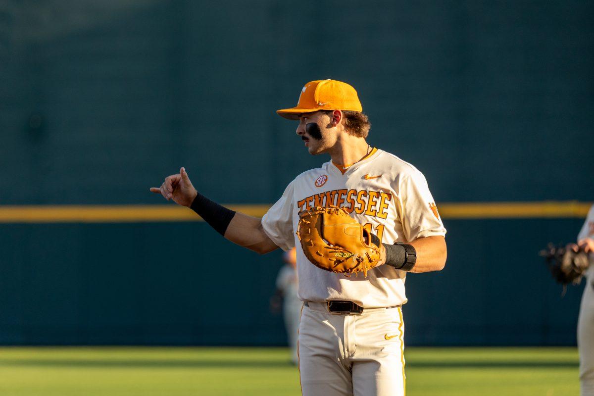 Andrew Fischer (11) signals to other players in the outfield as the Vols take one Bellarmine at Lindsay Nelson Stadium. Tuesday, April 15, 2025.