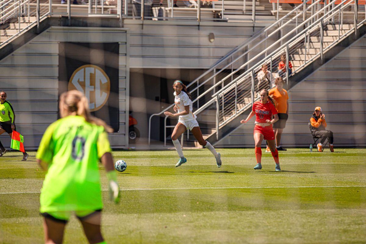 Anaiyah Robinson (9) blows by a defender during a spring matchup against Virginia Tech at Regal Stadium. Sunday, April 13, 2025.