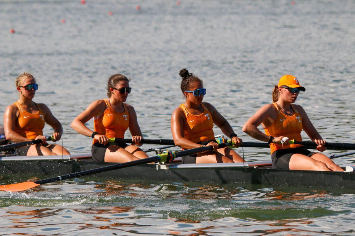 From left to right: Emarie Peacock, Grace Armstrong, Tiara Dye, and Alexandra Axten rowing back to shore after a race won during Rocky Top Invite at Melton Hill Lake. Friday, April 4, 2025.
