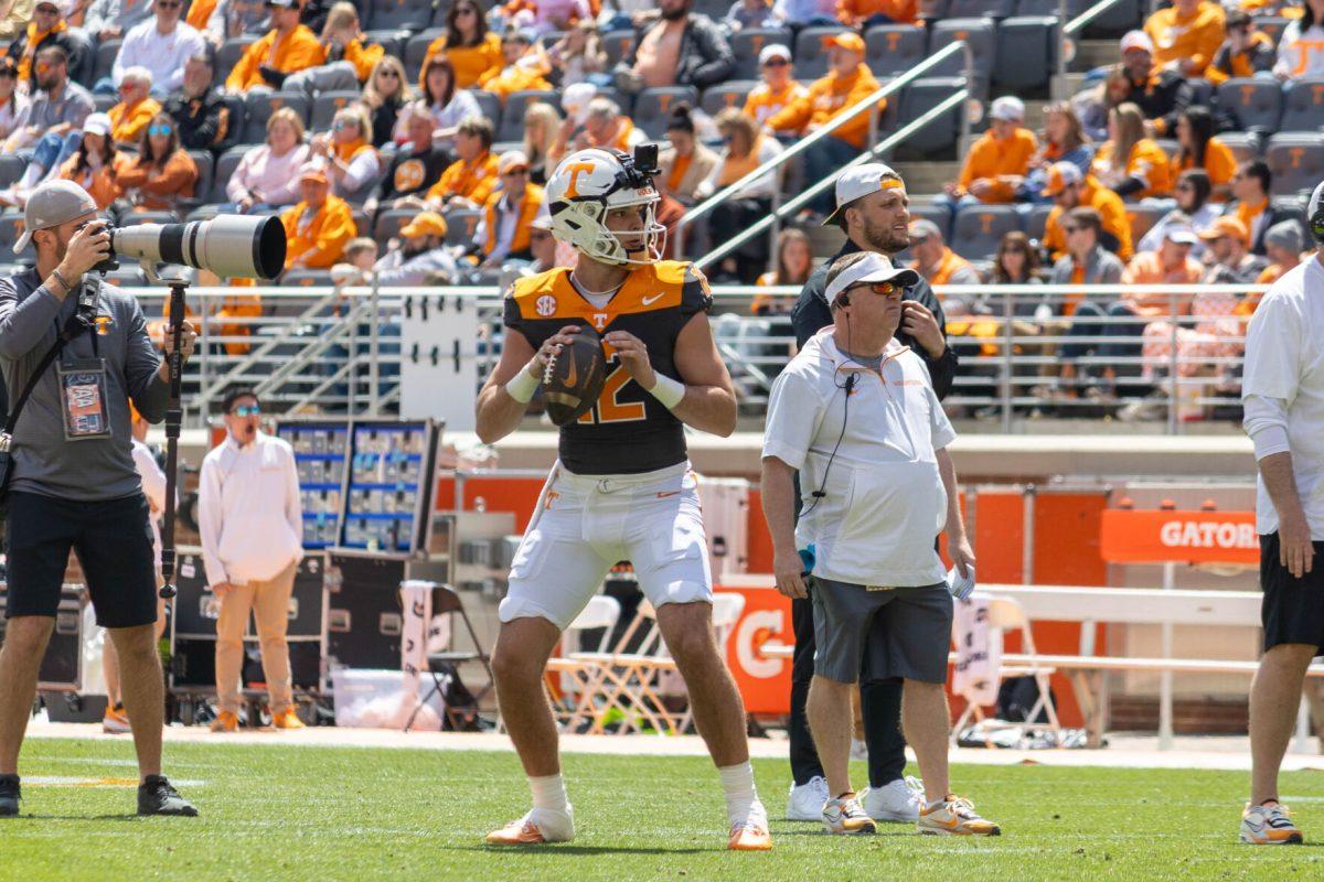Jake Merklinger (12) looks to pass during the Orange and White Game at Leyland Stadium. Saturday, April 12, 2025.