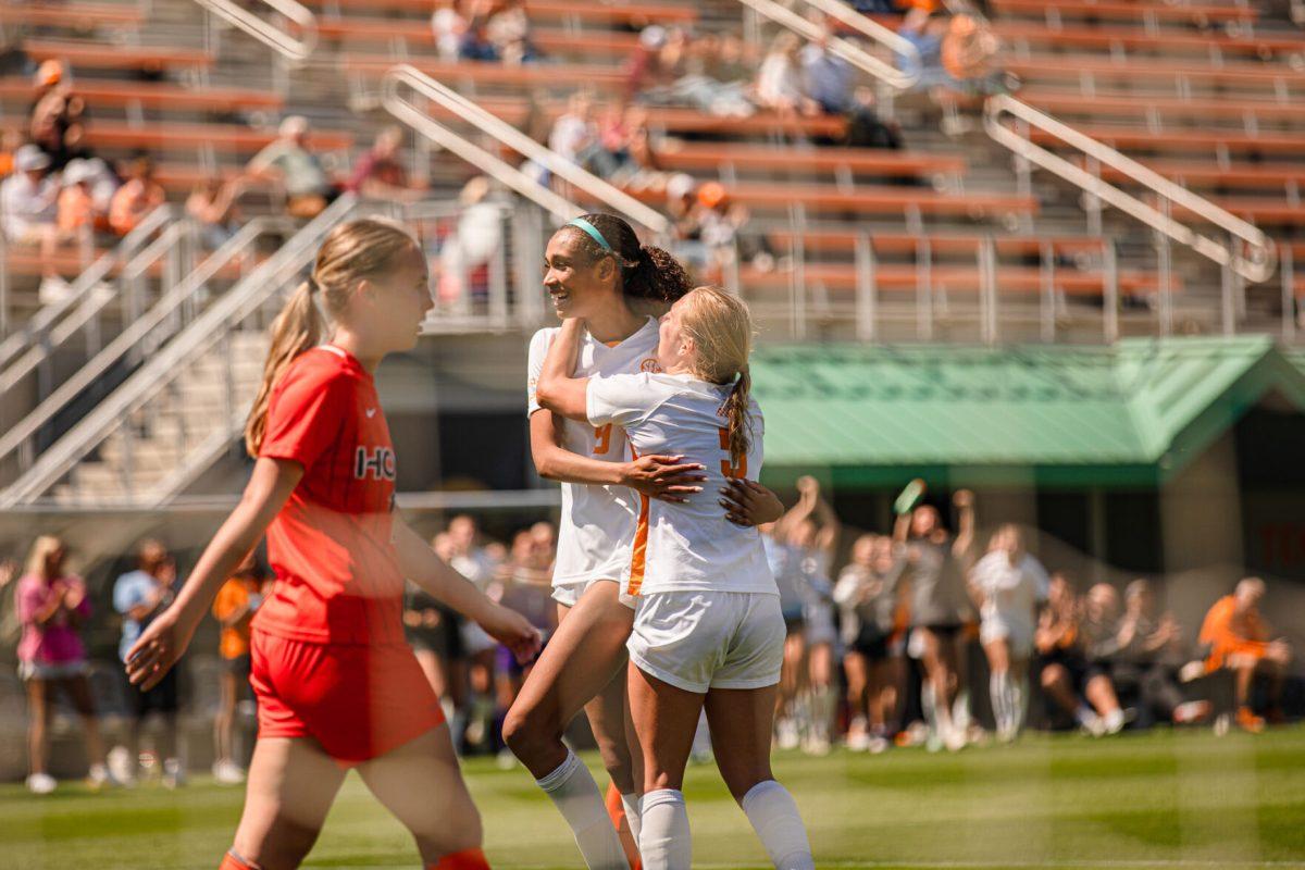 Anaiyah Robinson (9) and Jenna Stayart (5) celebrate after scoring a goal during a spring matchup against Virginia Tech at Regal Stadium. Sunday, April 13, 2025.