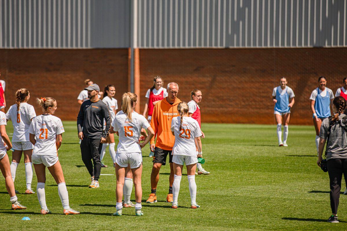 Head Coach Joe Kirt talks to his players before a spring matchup against Virginia Tech at Regal Stadium. Sunday, April 13, 2025.