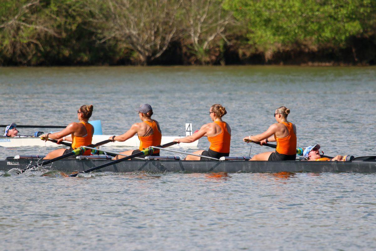 Coxwain of Tennessee's 1V4, Mykayla Fluster, seen coaching her rowers through the race during Rocky Top Invite at Melton Hill Lake. Friday, April 4, 2025.  