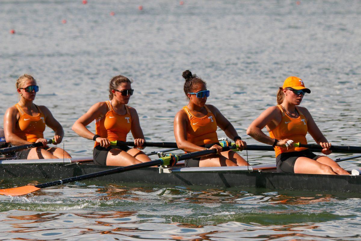 From left to right: Emarie Peacock, Grace Armstrong, Tiara Dye, and Alexandra Axten rowing back to shore after a race won during Rocky Top Invite at Melton Hill Lake. Friday, April 4, 2025.