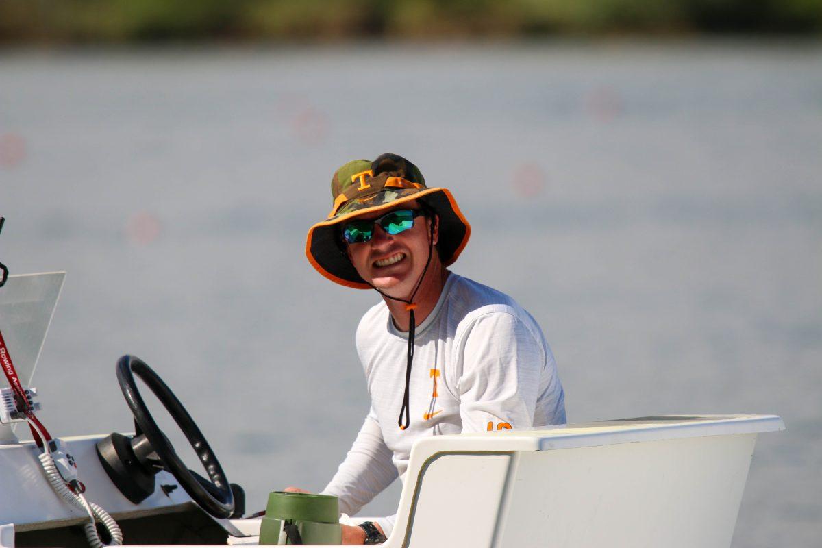 Tennessee rowing coach David Hall seen smiling from the water following another Tennessee win during Rocky Top Invite at Melton Hill Lake. Friday, April 4, 2025.