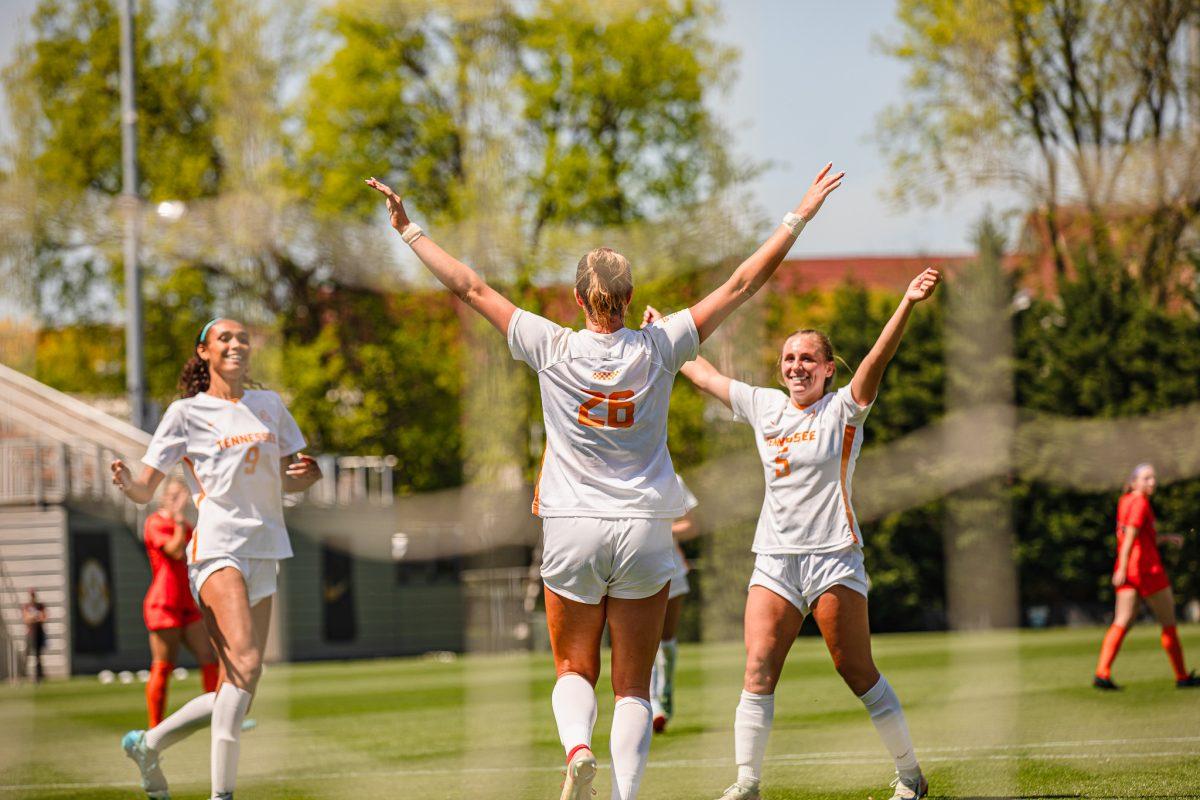 Sarah Kate Rath (26) celebrates with her teammates Anaiyah Robinson (9) and Jenna Stayart (5) after scoring a goal during a spring matchup against Virginia Tech at Regal Stadium. Sunday, April 13, 2025.