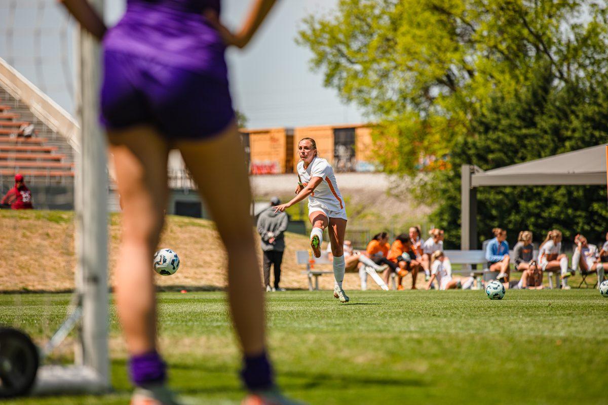 Jenna Stayart (5) shoots the ball during warmups before a spring matchup against Virginia Tech at Regal Stadium. Sunday, April 13, 2025.