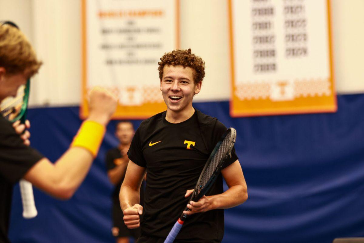 Lance Nisbet smiles after he and James Newton win their doubles set to give the vols a 1-0 lead heading into singles play, against Alabama State at Goodfriend Tennis Center. Saturday, May 3, 2025