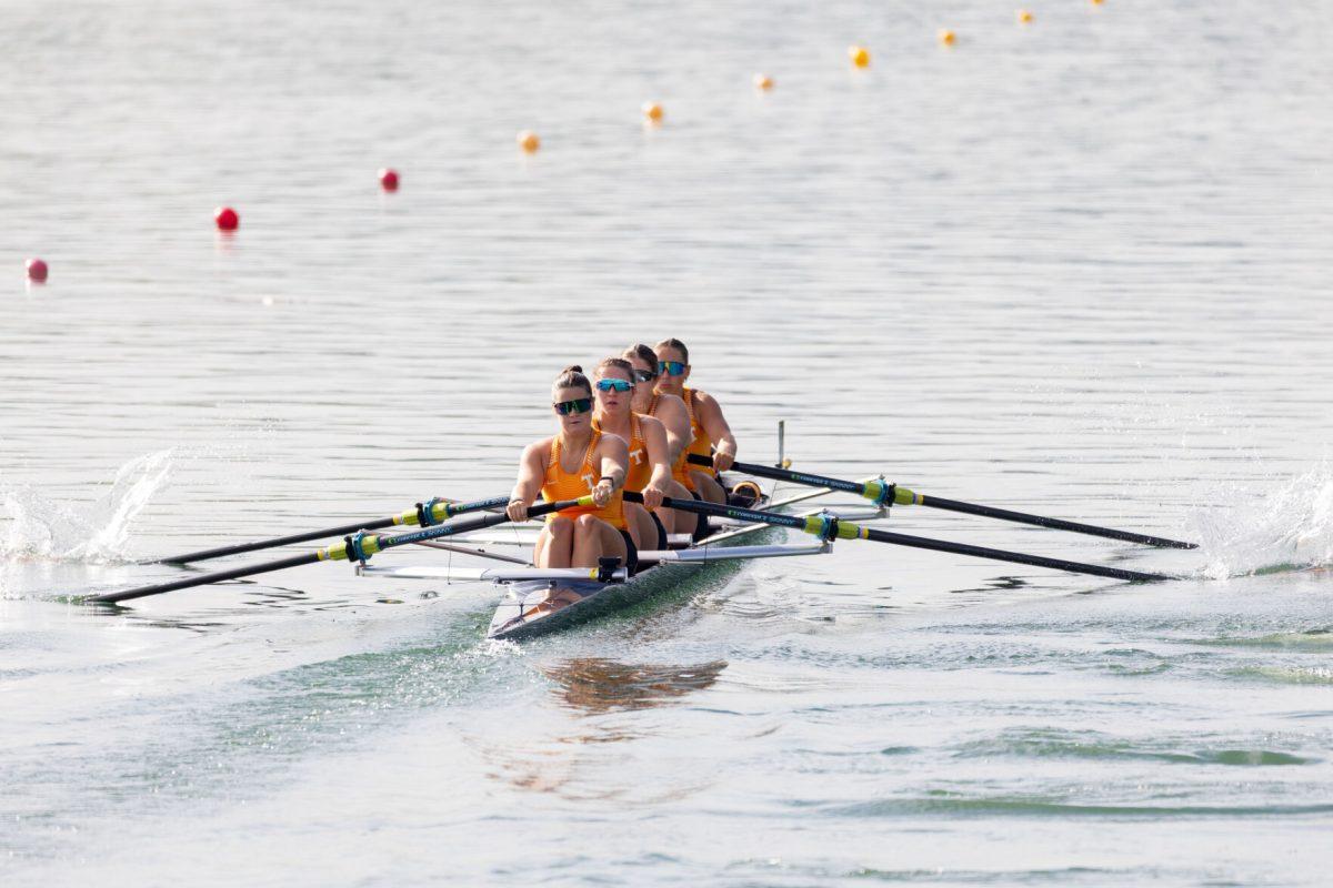 Cailin Bolt sitting stern seat of Tennessee’s 3V8 as they head down the course at the SEC Championship on Melton Hill Lake. Sunday, May 11, 2025. 