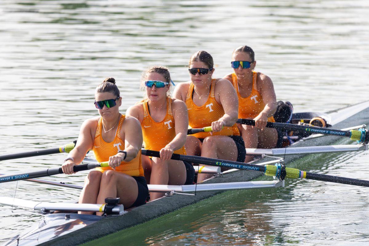 (From left to right) Rowers Cailin Bolt, Kathryn Burton, Bernadette Lombardi, and Maddie Becker drivng into the start of the 3V4 race at the SEC Championship on Melton Hill Lake. Sunday, May 11, 2025.