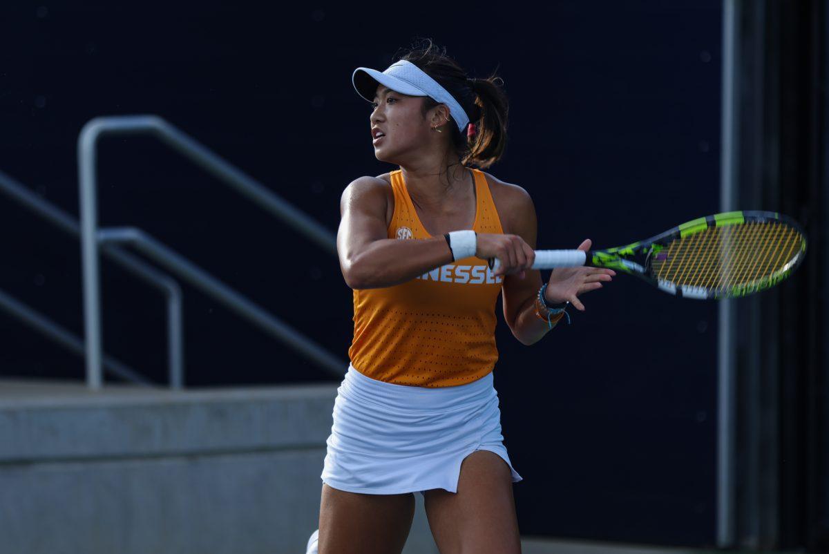 Catherine Aulia hits a forehand against Virginia at UVA Tennis Complex. Friday, May 9, 2025.